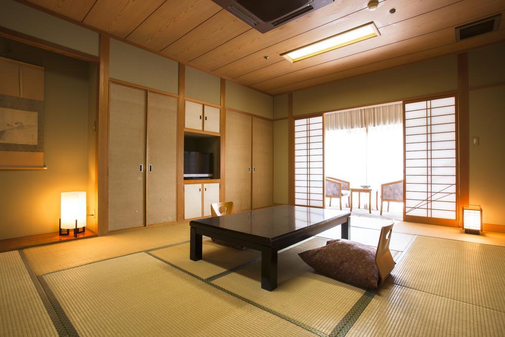 Tomiya Hotell Shin'onsen Rum bild